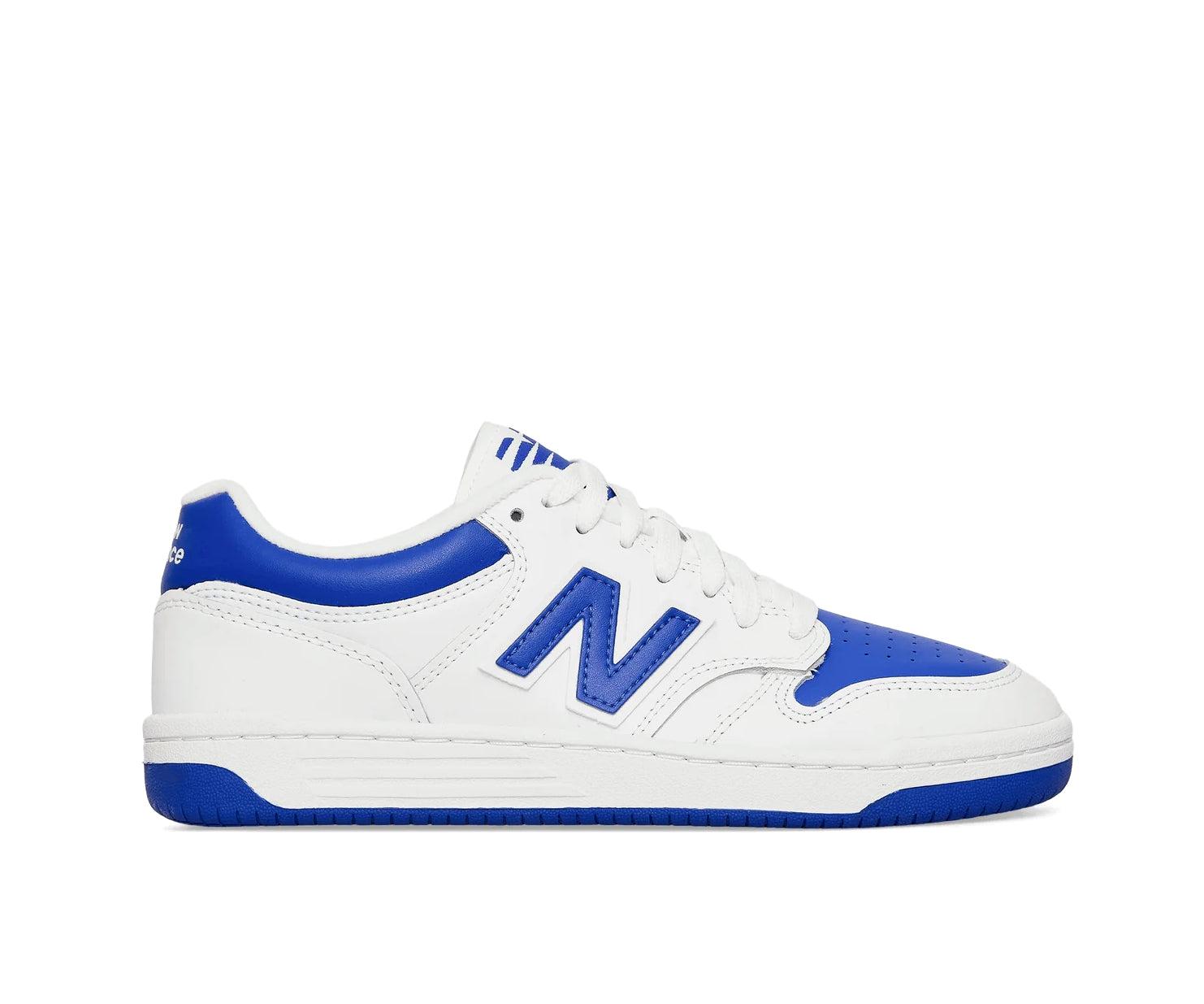 A white leather New Balance basketball shoe with cobalt blue accents.