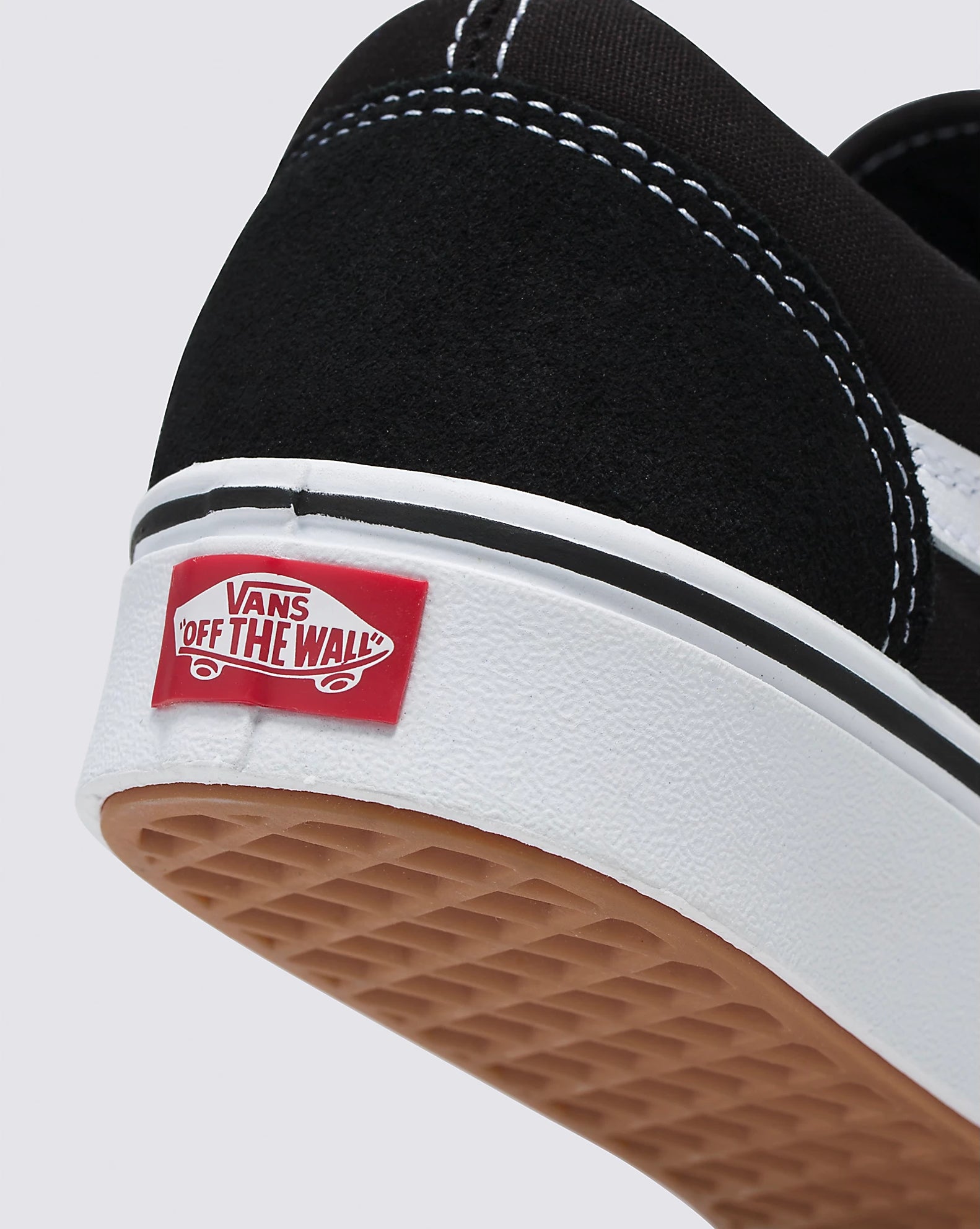 A black and white canvas lace-up skate shoe from Vans.